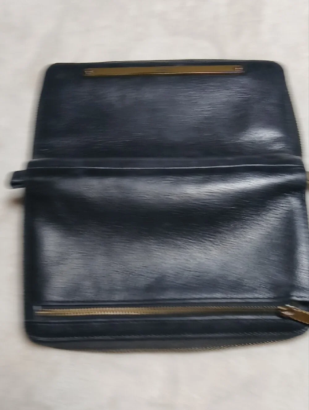 Fossil Black Leather Zip-Around Wallet with Gold Accent